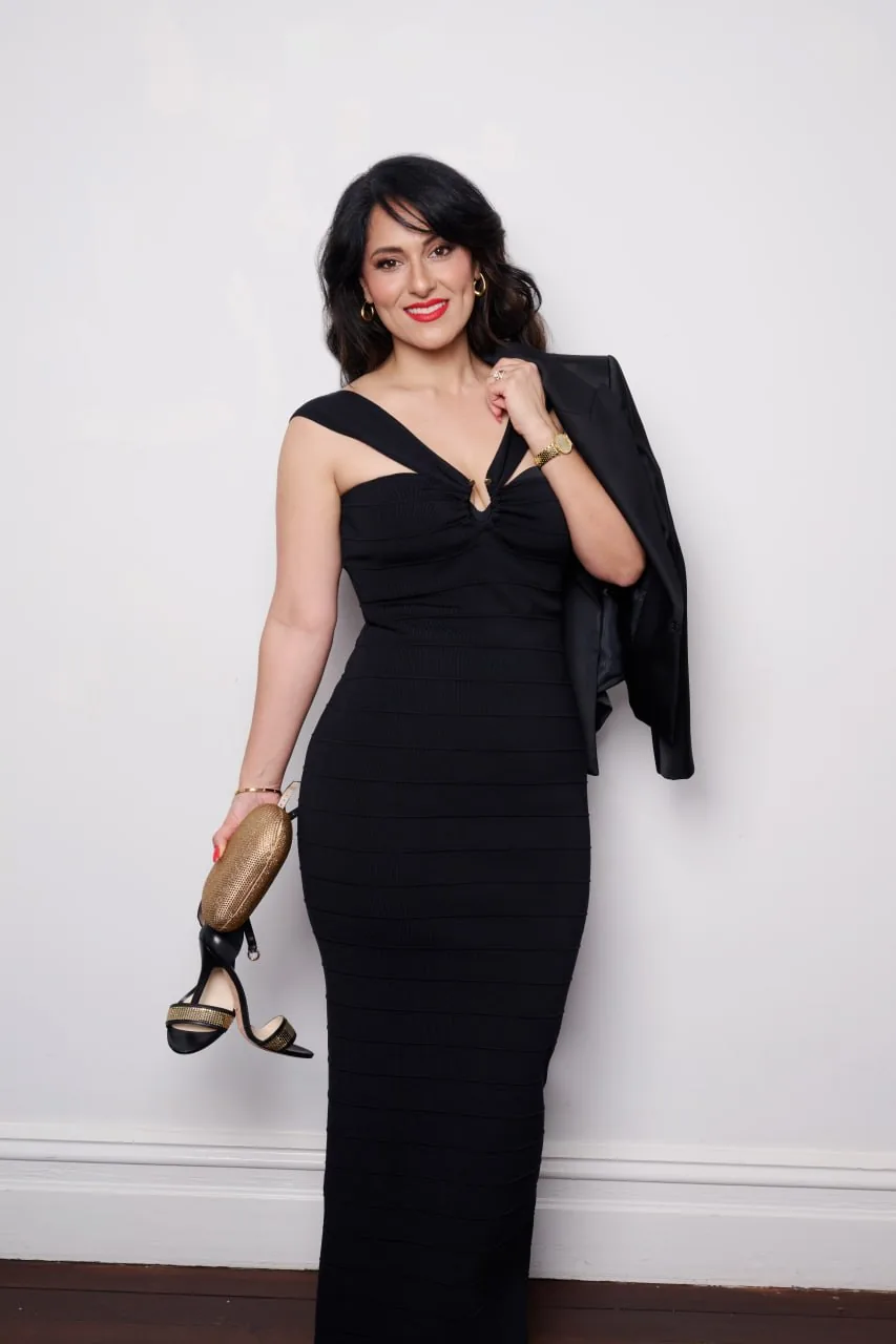 Mina Azarian, personal stylist in Perth, in a tailored teal suit